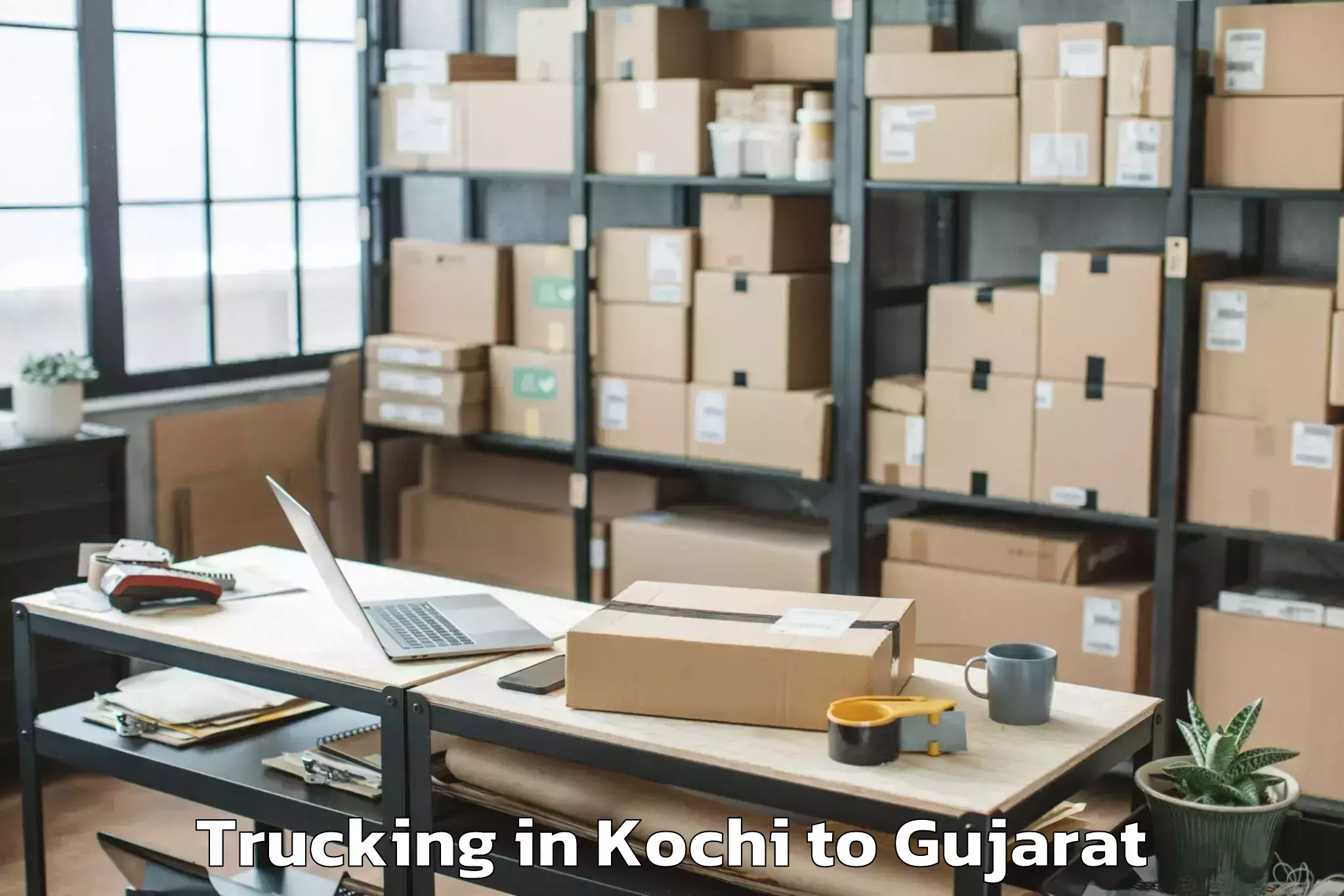 Easy Kochi to Crystal Mall Rajkot Trucking Booking